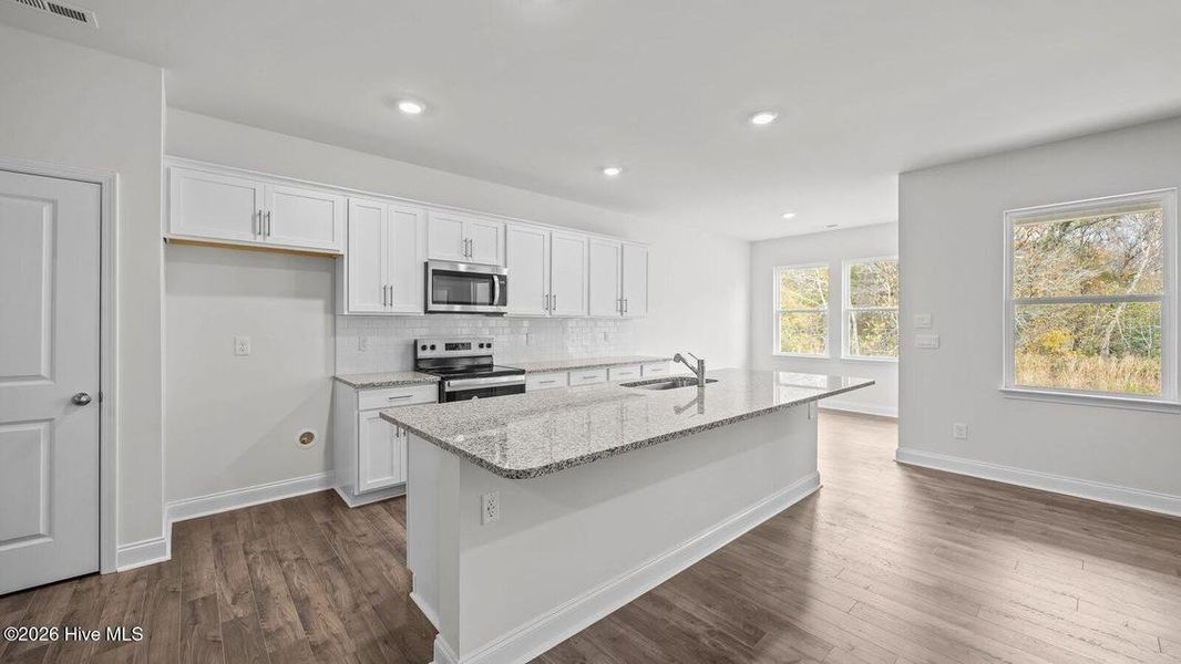 Furnished interior view inside a new home in Villa Grande, Winterville (Image 7).