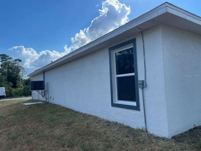 Exterior details and patio area of a home in , Port Charlotte (Image 8). Exterior details and patio area of a home in , Port Charlotte (Image 8).