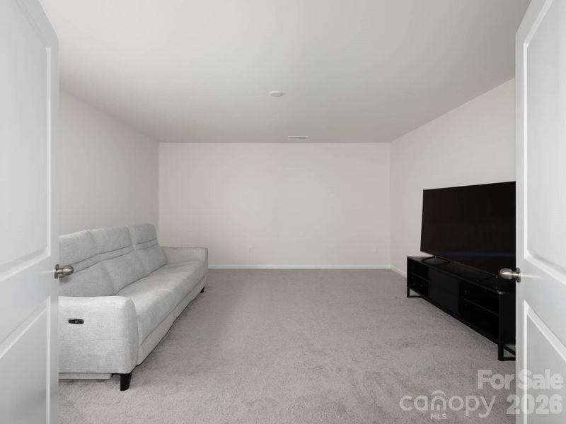 Large, upstairs bonus room.