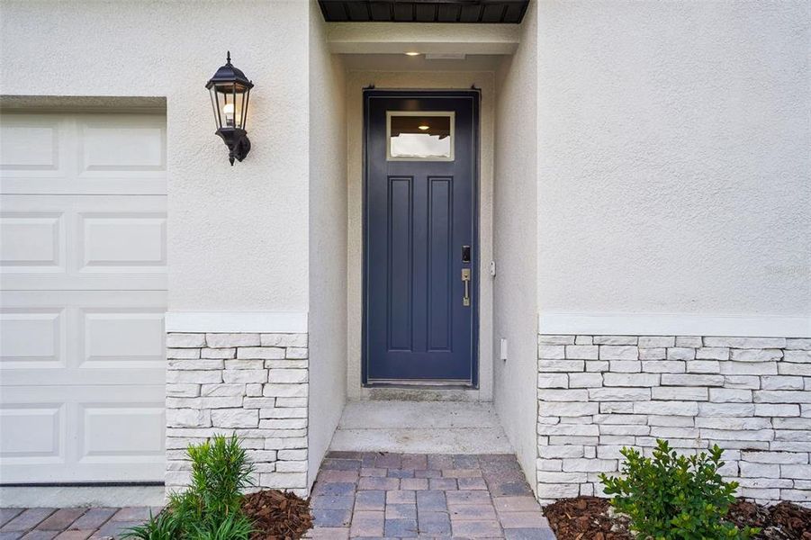 Exterior details and patio area of a home in Pine Ridge Meadows, Hudson (Image 22).