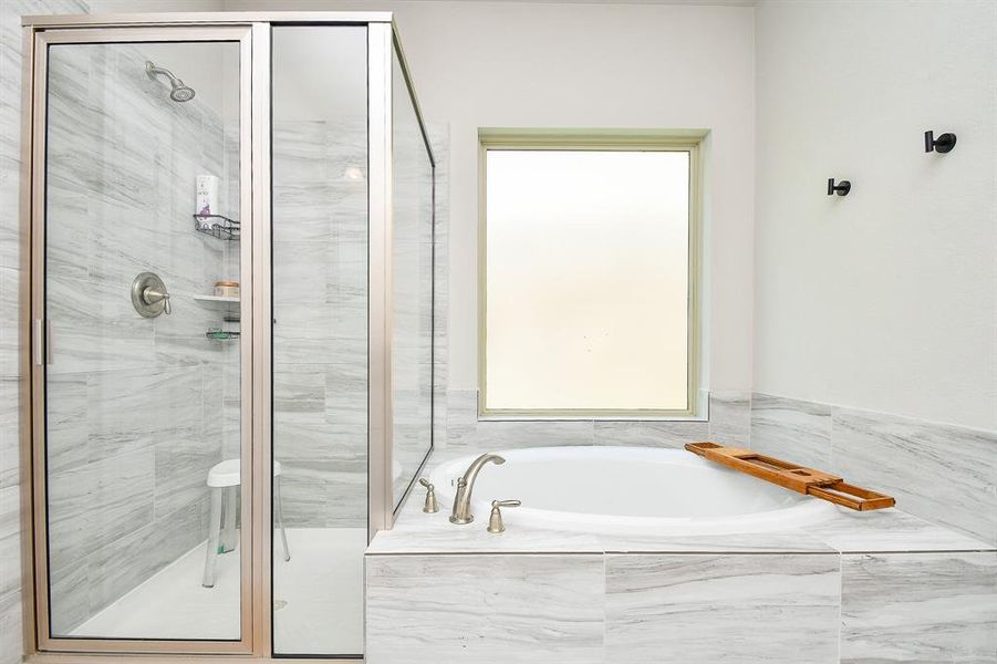 Shower and soaking tub.