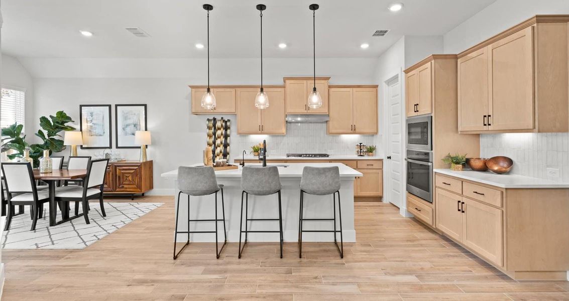 Furnished interior view inside a new home in 6 Creeks, Kyle (Image 6).