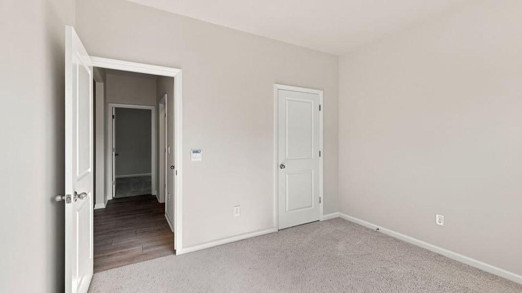 Spacious, unfurnished interior of a new home in Durbin Meadows Traditions, Fountain Inn (Image 15).