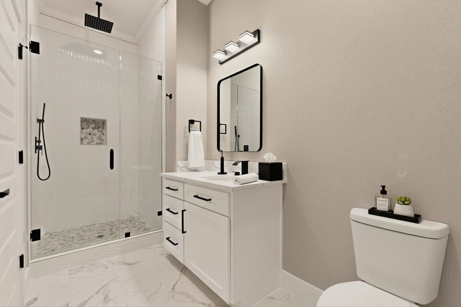 Full bathroom featuring a stall shower, Full bathroom featuring a stall shower,