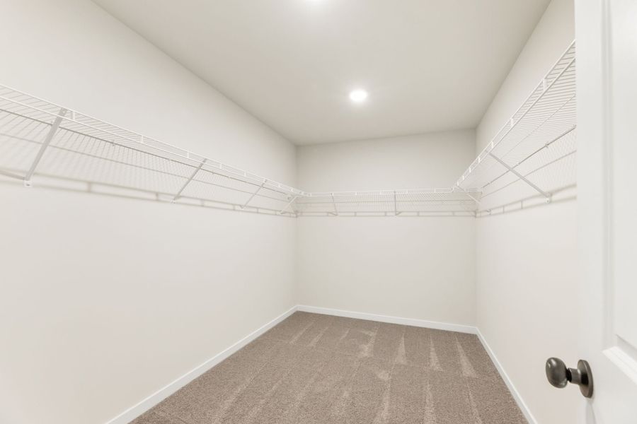 A hallway with white walls. A hallway with white walls.