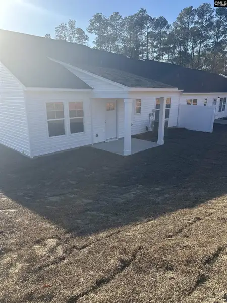 Exterior details and patio area of a home in Piney Woods Bluff, Columbia (Image 3).