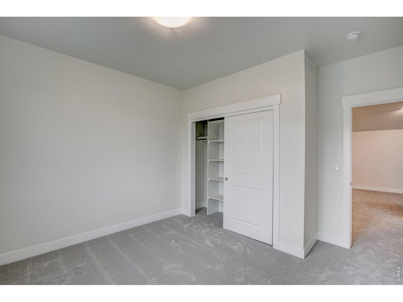 Spacious, unfurnished interior of a new home in The Lakes at Centerra - The Shores, Loveland (Image 30).