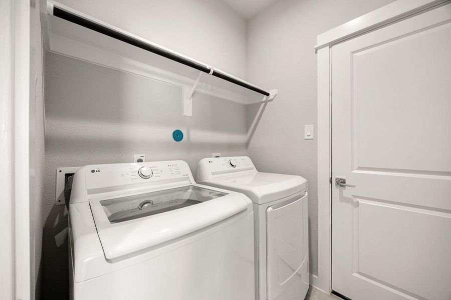 Utility Room. The home will include a washer & dryer.