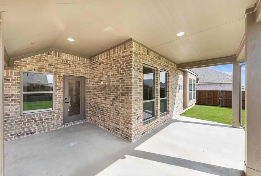 Exterior details and patio area of a home in Heartland, Heartland (Image 3). Exterior details and patio area of a home in Heartland, Heartland (Image 3).