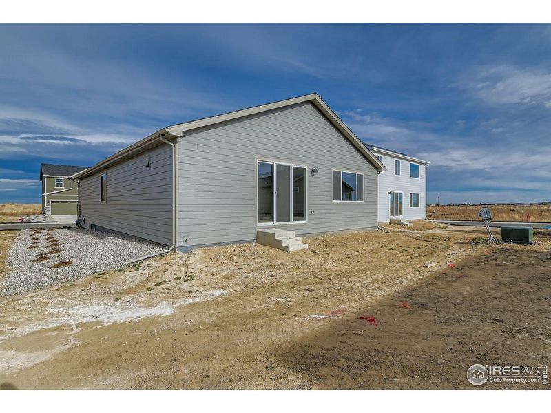 Exterior details and patio area of a home in Hidden Creek, Frederick (Image 28).