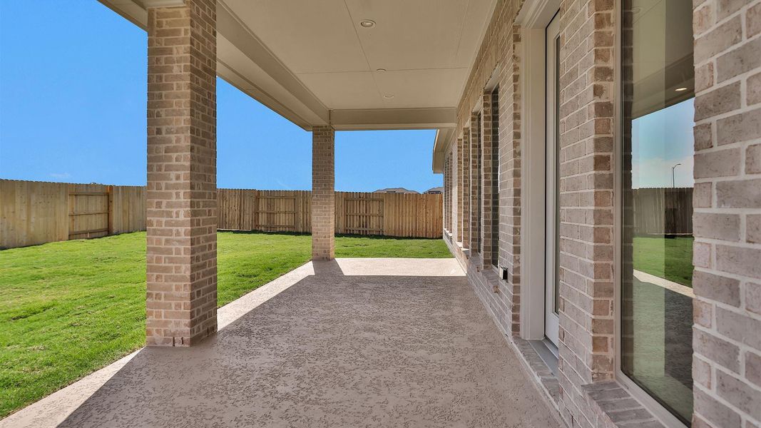 Exterior details and patio area of a home in Elyson 55', Katy (Image 4). Exterior details and patio area of a home in Elyson 55', Katy (Image 4).