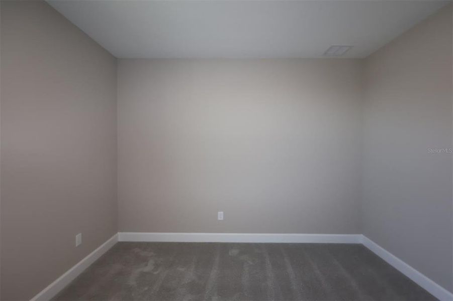 Spacious, unfurnished interior of a new home in Lake Star at Ovation, Winter Garden (Image 13).