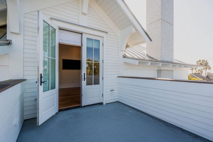 Exterior details and patio area of a home in , Folly Beach (Image 52).