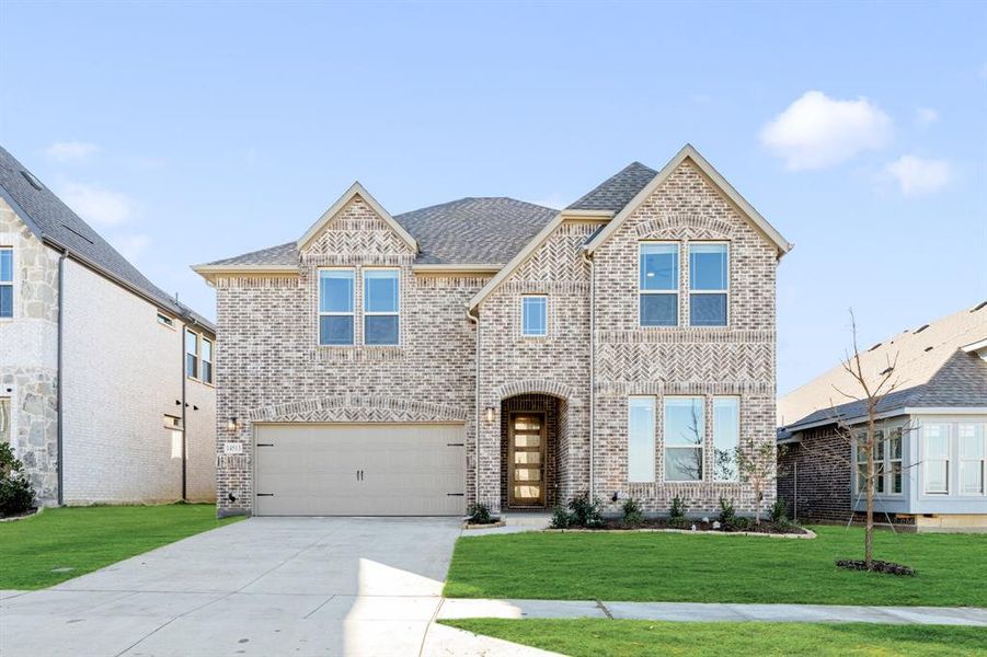 Front exterior of a new home in Creekview Meadows, Pilot Point, TX, highlighting curb appeal (Image 2).