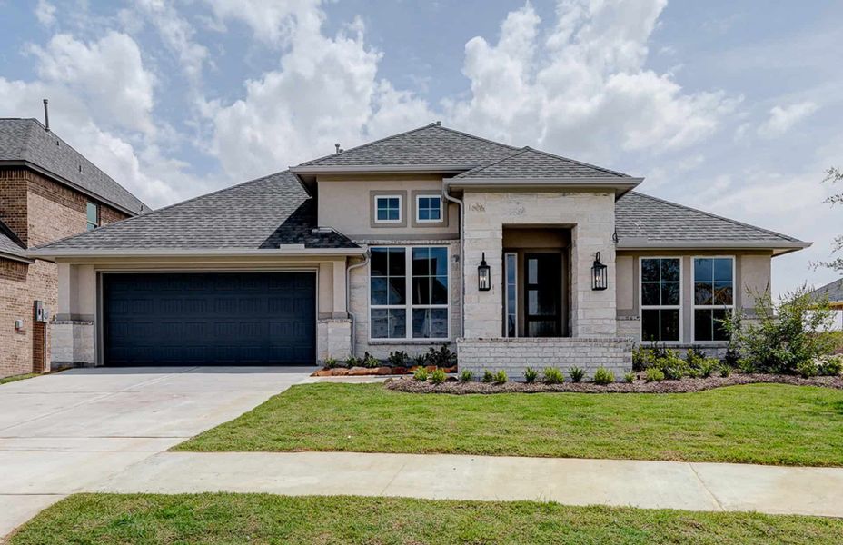 Representative exterior photo of a completed home built from the 2870 by Ravenna Homes in The Woodlands Hills 65′, Willis, TX (Image 2). Representative exterior photo of a completed home built from the 2870 by Ravenna Homes in The Woodlands Hills 65′, Willis, TX (Image 2).