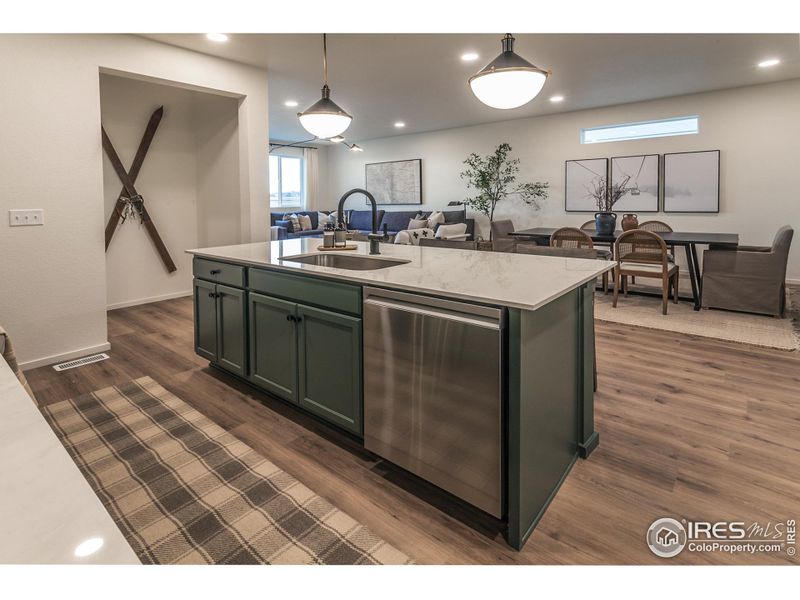 EXAMPLE PHOTO: KITCHEN OPEN TO DINING AND LIVING ROOM