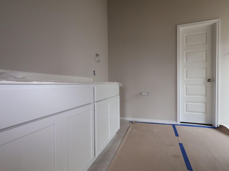 In-progress construction of a new home in Carillon, Manor, TX (Image 21).