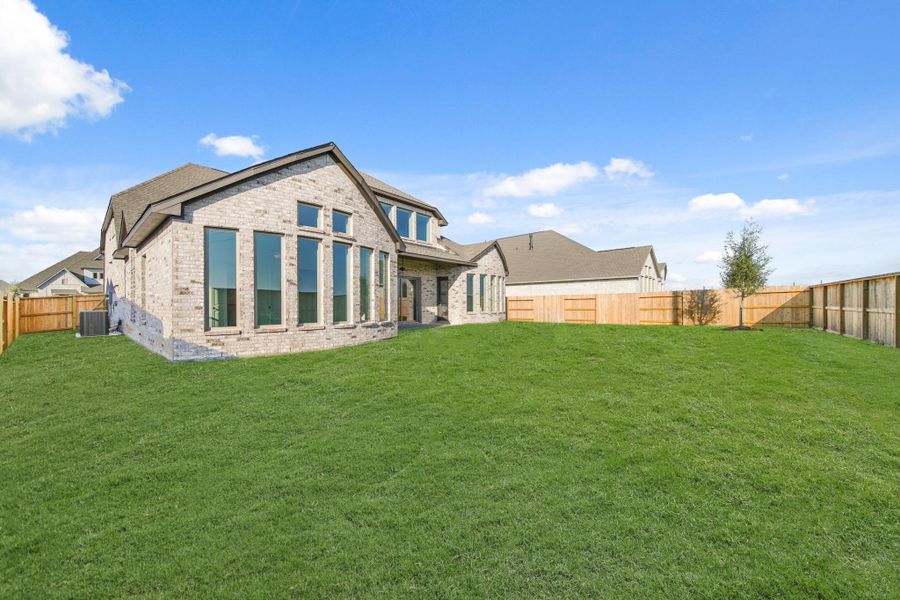 Exterior details and patio area of a home in Valencia 70', Manvel (Image 3). Exterior details and patio area of a home in Valencia 70', Manvel (Image 3).