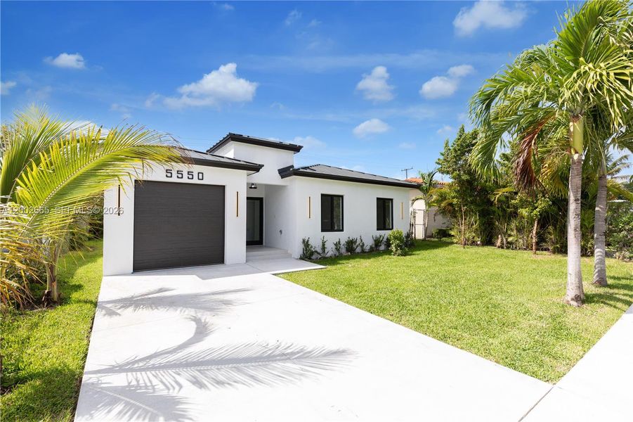 Front exterior of a new home in , Miami, FL, highlighting curb appeal (Image 21).