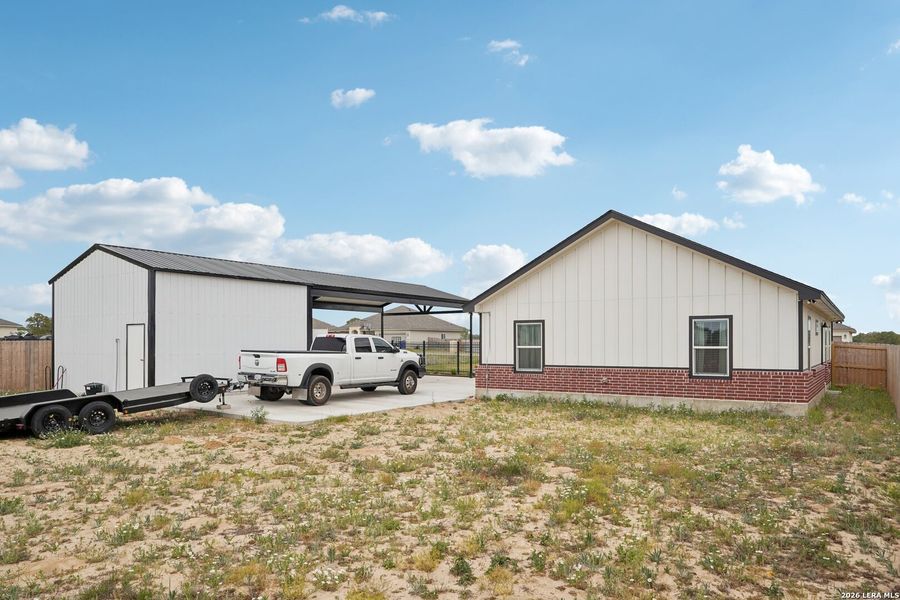 Exterior details and patio area of a home in , La Vernia (Image 25).