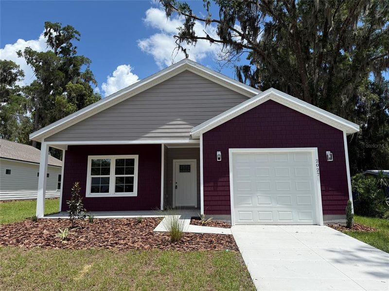 Front exterior of a new home in , Gainesville, FL, highlighting curb appeal (Image 1). Front exterior of a new home in , Gainesville, FL, highlighting curb appeal (Image 1).