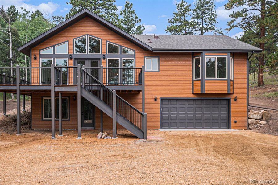 Front exterior of a new home in , Bailey, CO, highlighting curb appeal (Image 24).