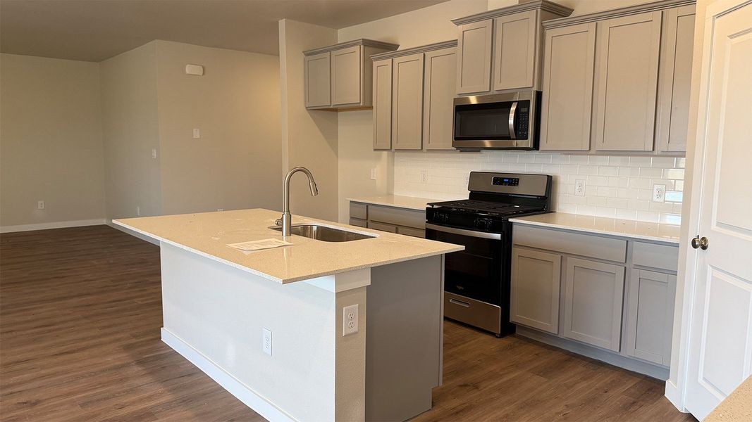 Furnished interior view inside a new home in The Lakes Northwest, Robstown (Image 7).