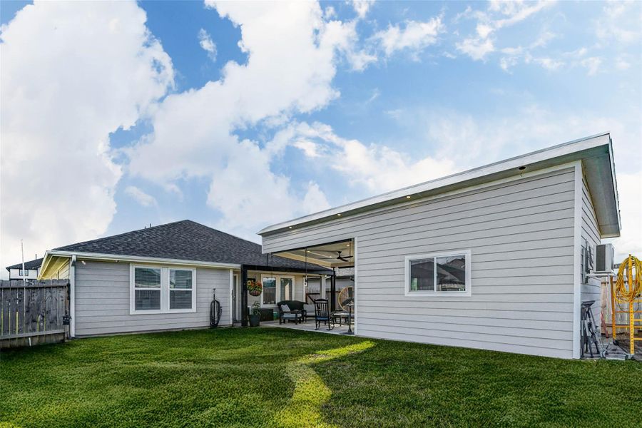 Exterior details and patio area of a home in Tamarron, Fulshear (Image 2). Exterior details and patio area of a home in Tamarron, Fulshear (Image 2).