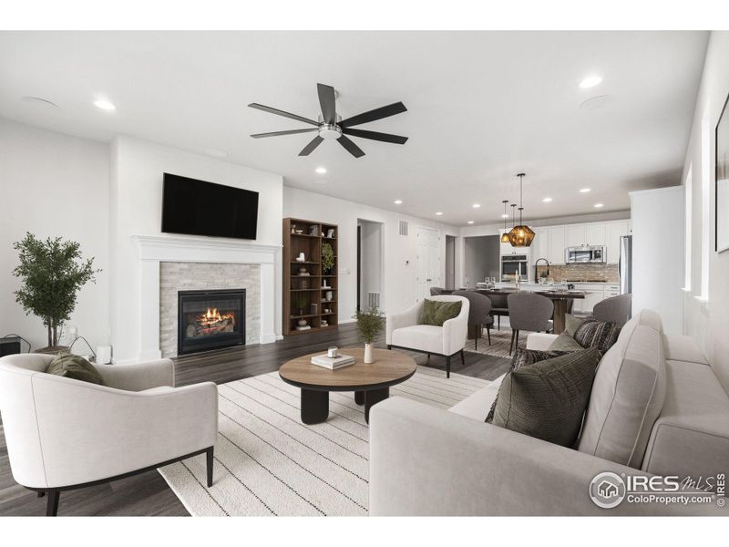 This photo has been virtually staged to provide visual ideas for how furniture can be arranged in this area of the home.