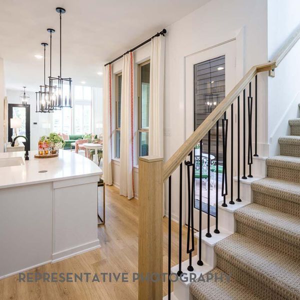Furnished interior view inside a new home in Bridgeland, Cypress (Image 32).