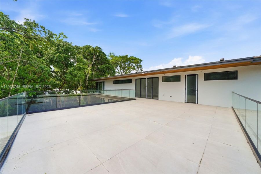 Exterior details and patio area of a home in , Miami (Image 3). Exterior details and patio area of a home in , Miami (Image 3).