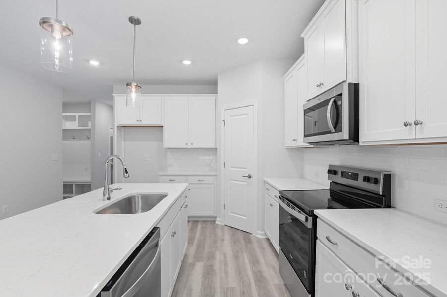 Furnished interior view inside a new home in , Statesville (Image 7).