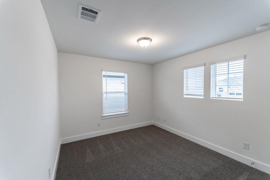 Spacious, unfurnished interior of a new home in Santa Rita Ranch, Liberty Hill (Image 15).