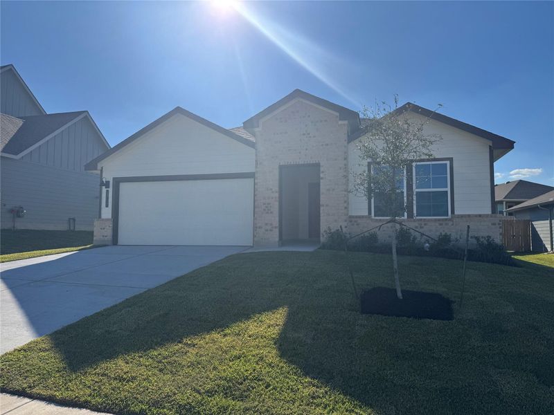 Exterior details and patio area of a home in Liberty Village, Brenham (Image 2).