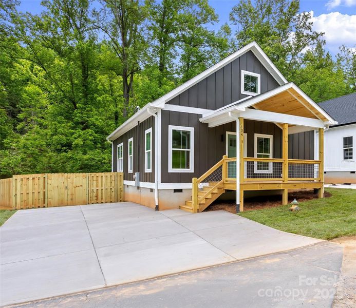 Front exterior of a new home in , Old Fort, NC, highlighting curb appeal (Image 13).
