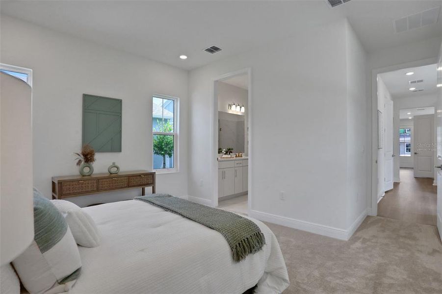 Furnished interior view inside a new home in Bungalow Walk at Lakewood Ranch, Sarasota (Image 11).