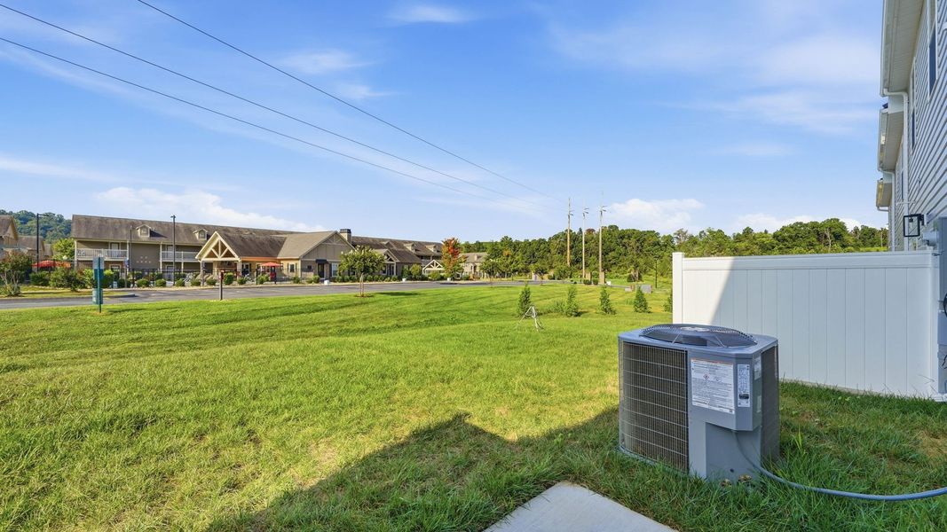 Exterior details and patio area of a home in The Arbor Townhomes, Kingsport (Image 4).