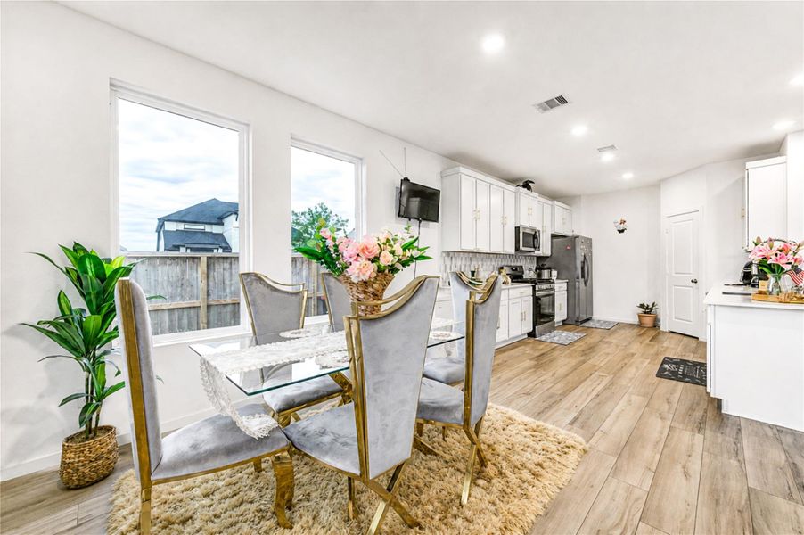 Furnished interior view inside a new home in Harvest Green, Richmond (Image 28).