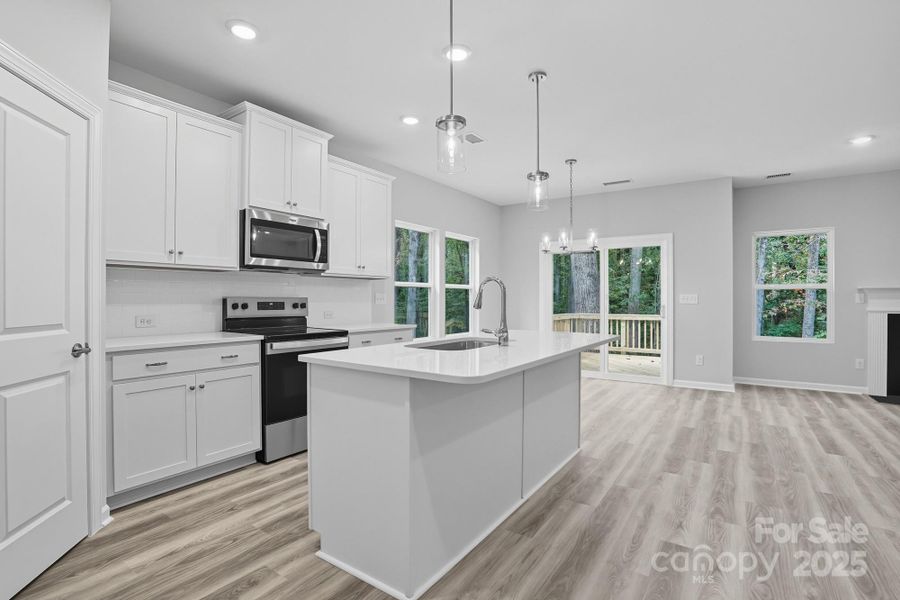 Furnished interior view inside a new home in , Statesville (Image 8).