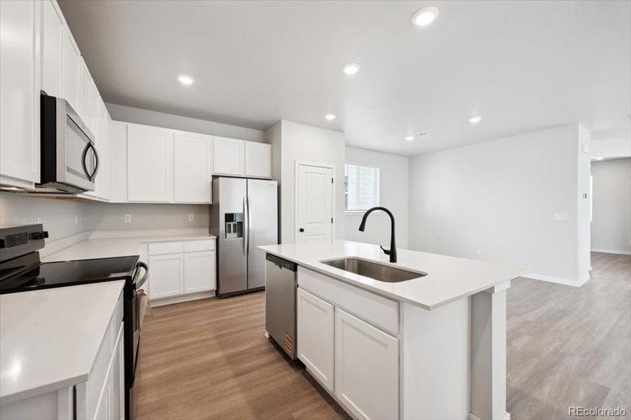 Furnished interior view inside a new home in The Boulevard II Collection at Windler, Aurora (Image 10). Furnished interior view inside a new home in The Boulevard II Collection at Windler, Aurora (Image 10).