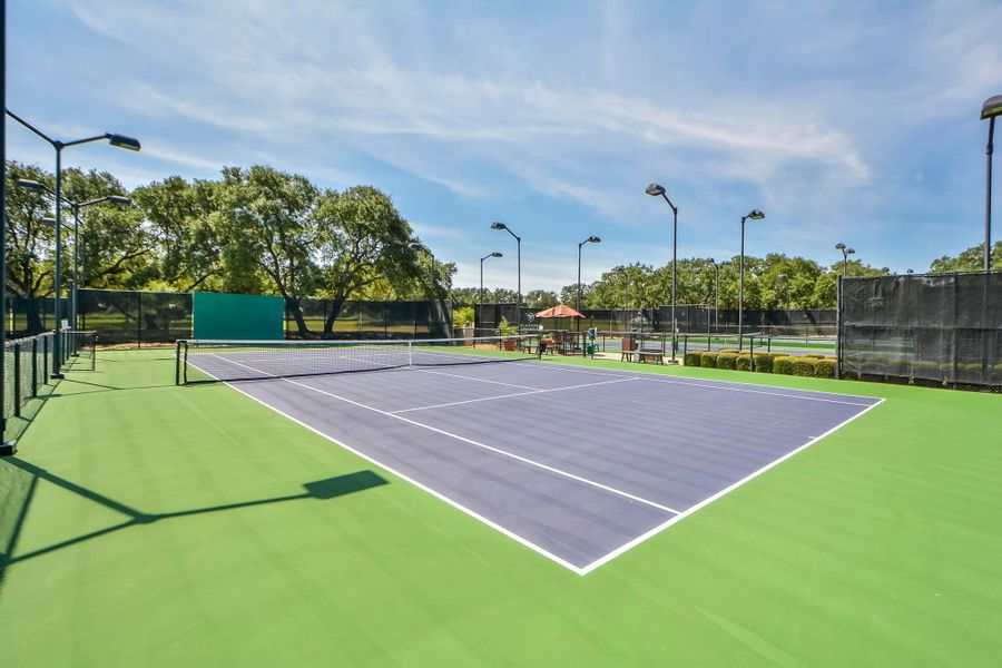 View of tennis court featuring community basketball court