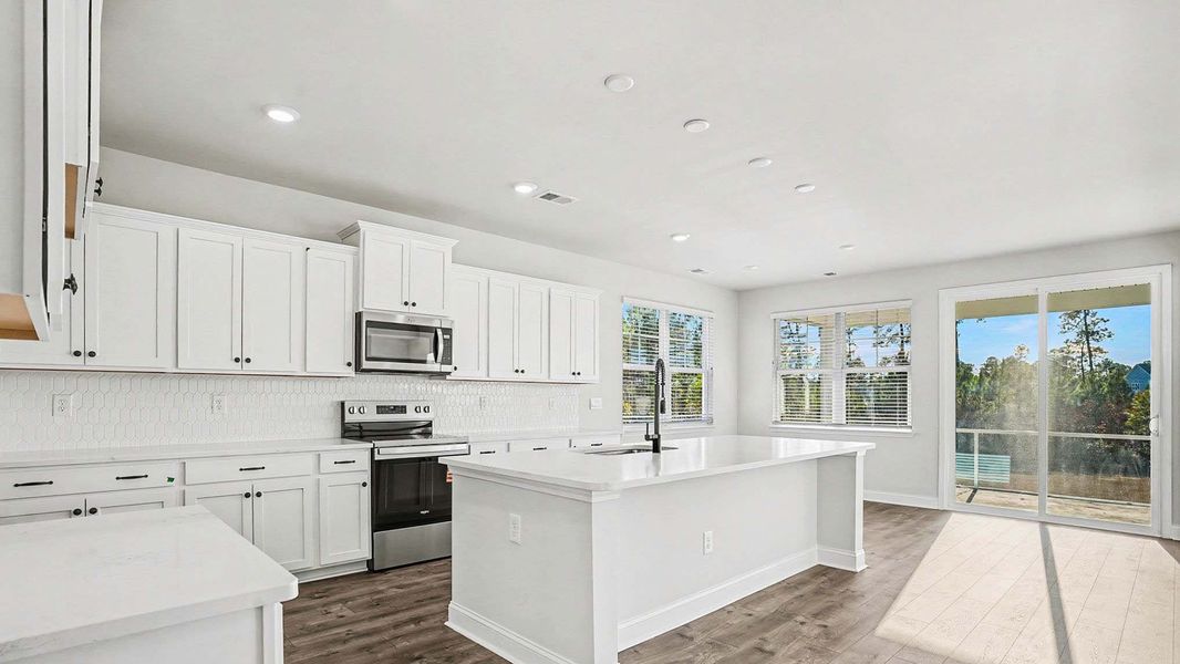 Representative furnished interior of a home built from the Alder by D.R. Horton in Auberon Woods, Conway (Image 6).