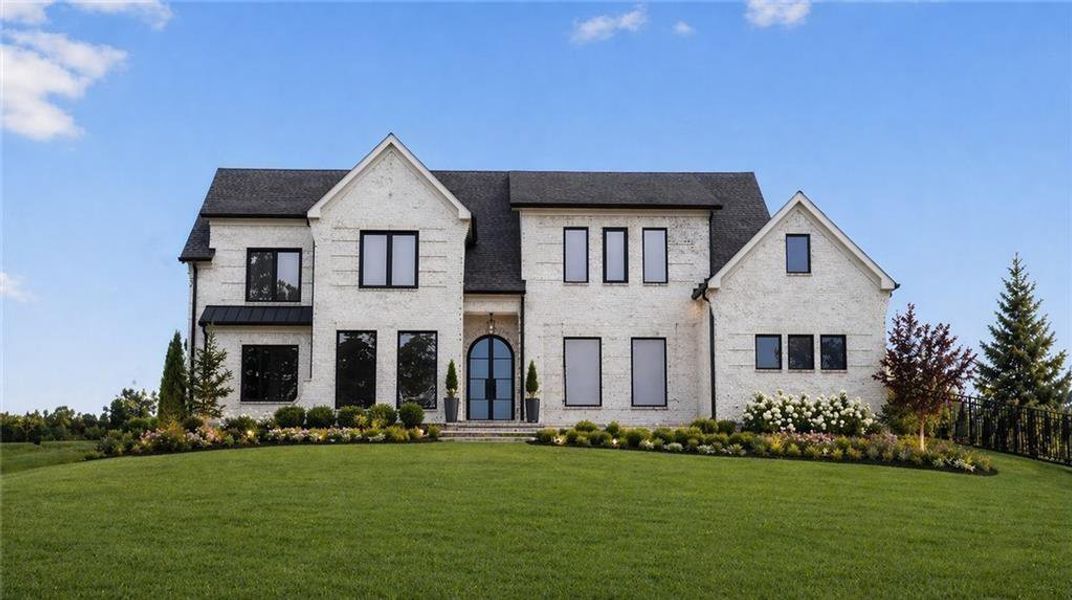 Front exterior of a new home in , Hoschton, GA, highlighting curb appeal (Image 23). Front exterior of a new home in , Hoschton, GA, highlighting curb appeal (Image 23).