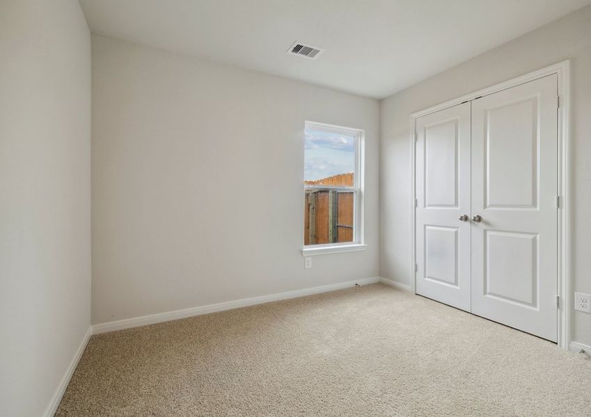Secondary bedroom with a closet Secondary bedroom with a closet