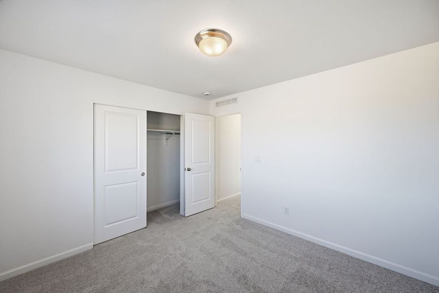 Spacious, unfurnished interior of a new home in Trailstone Town Collection, Arvada (Image 30).