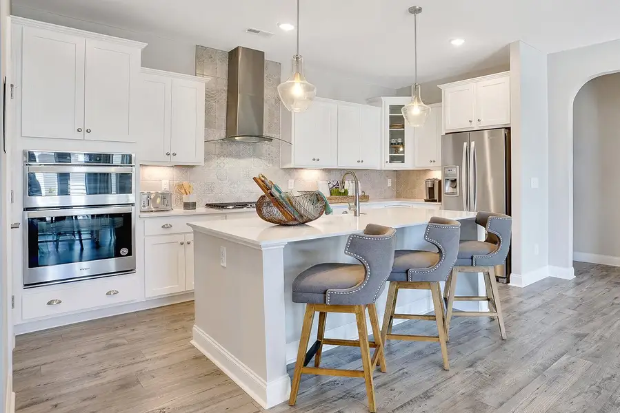 Representative furnished interior of a home built from the Promenade by McKee Homes in The Cottages at 78 North, Sanford (Image 18).