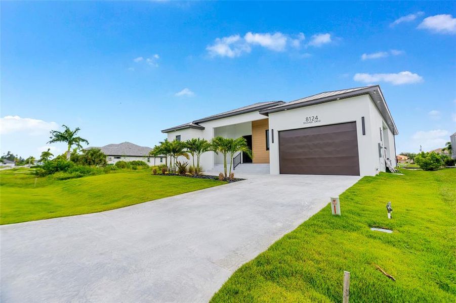 Front exterior of a new home in , Port Charlotte, FL, highlighting curb appeal (Image 32).