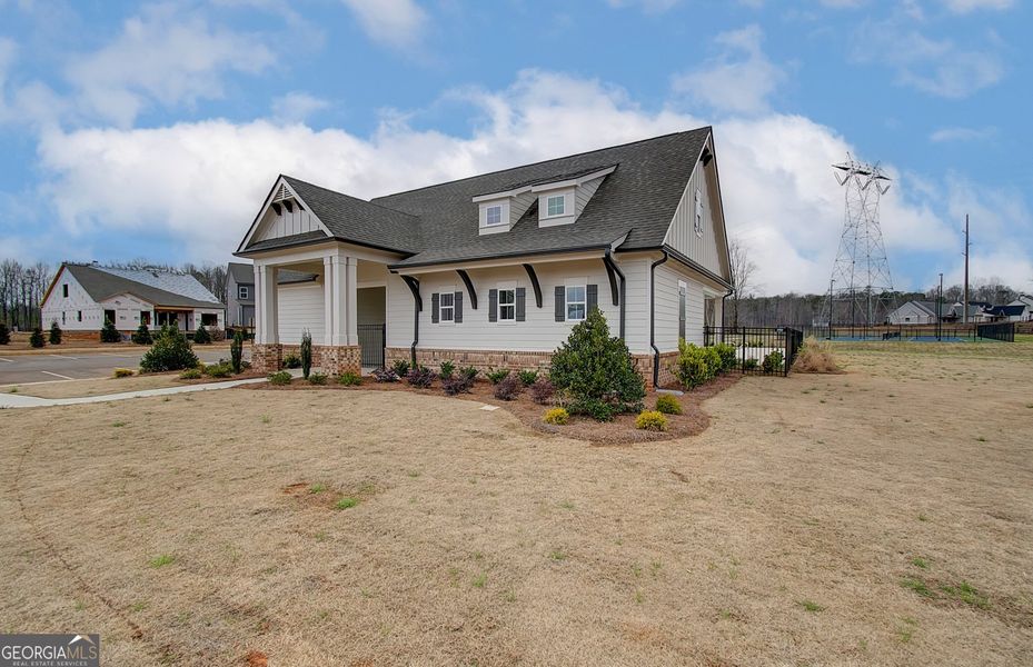 Front exterior of a new home in Ponderosa Farms Manor, Gainesville, GA, highlighting curb appeal (Image 24).