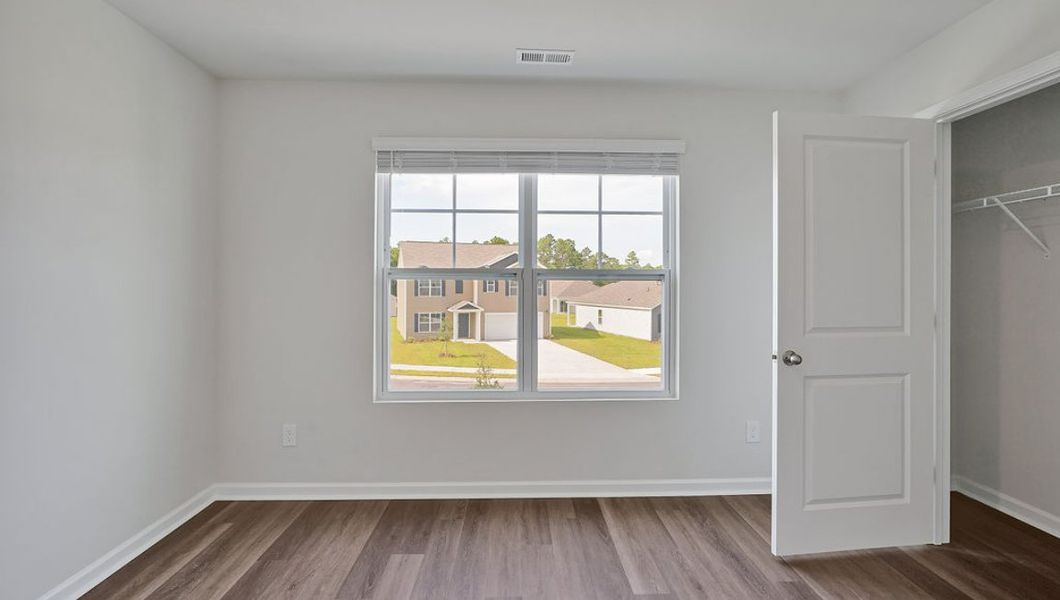 Representative unfurnished interior of a home built from the Hayden by D.R. Horton in Cedar Hill Landing, Navassa (Image 35).