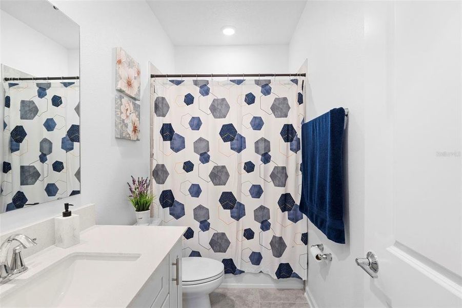 Furnished interior view inside a new home in Rhett's Ridge: Legacy Collection, Apopka (Image 44).